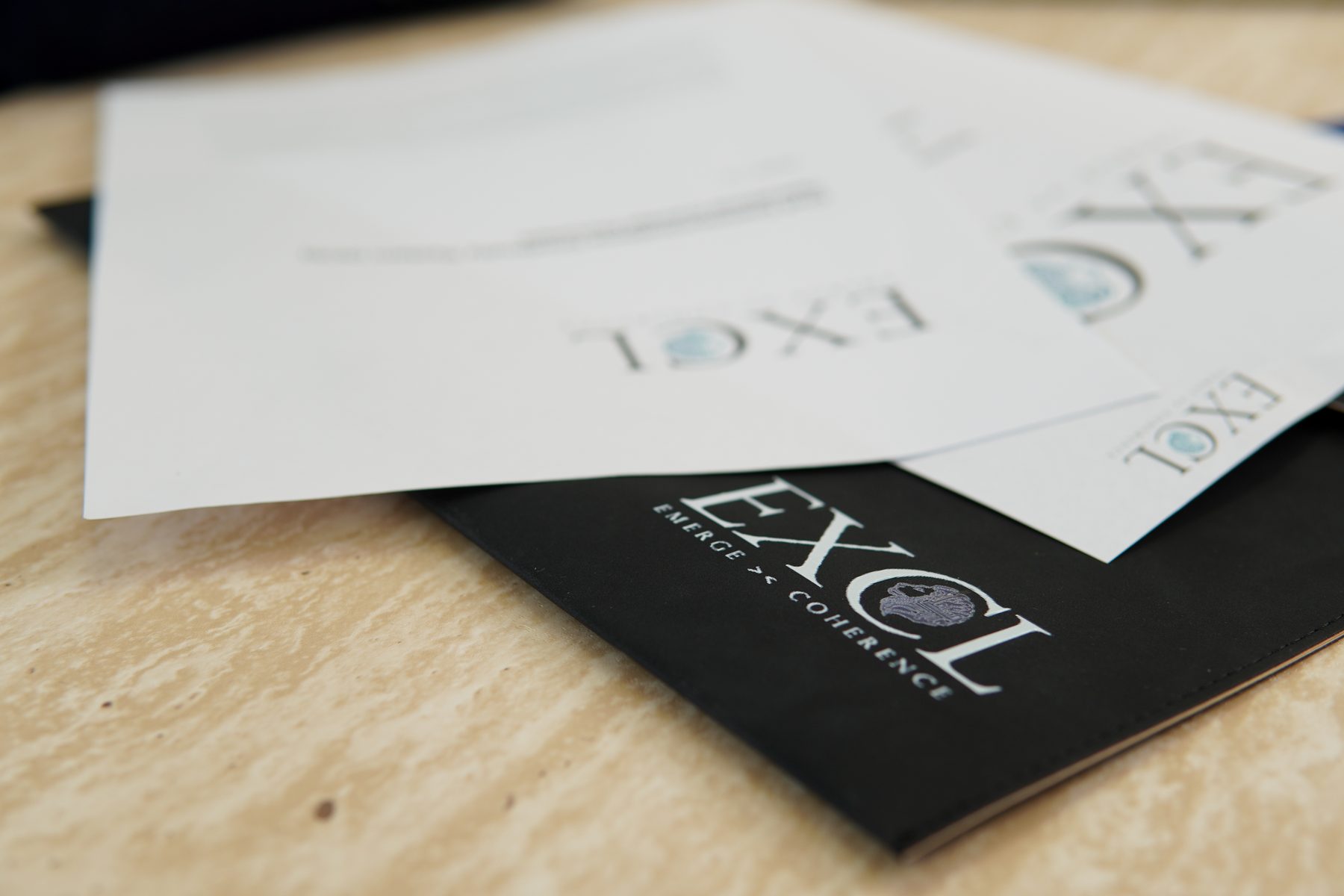 EXCL branded documents and materials